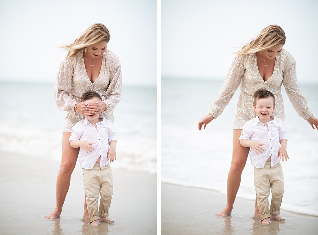 mom playing peek-a-boo with son at their beach family session