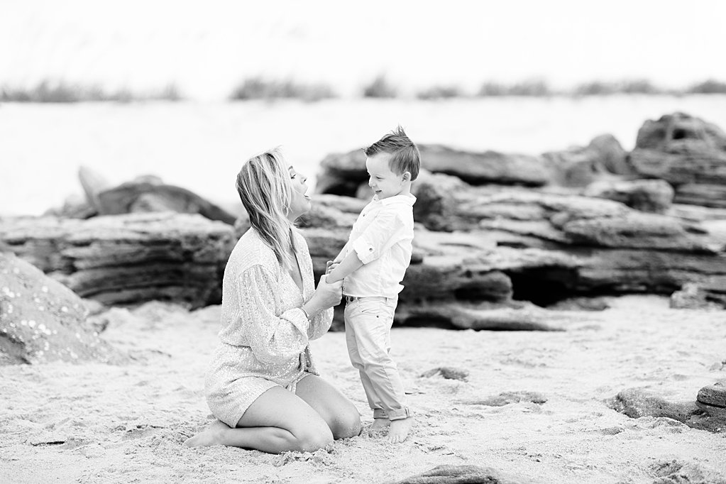 mom and son talking during their sweet family beach session